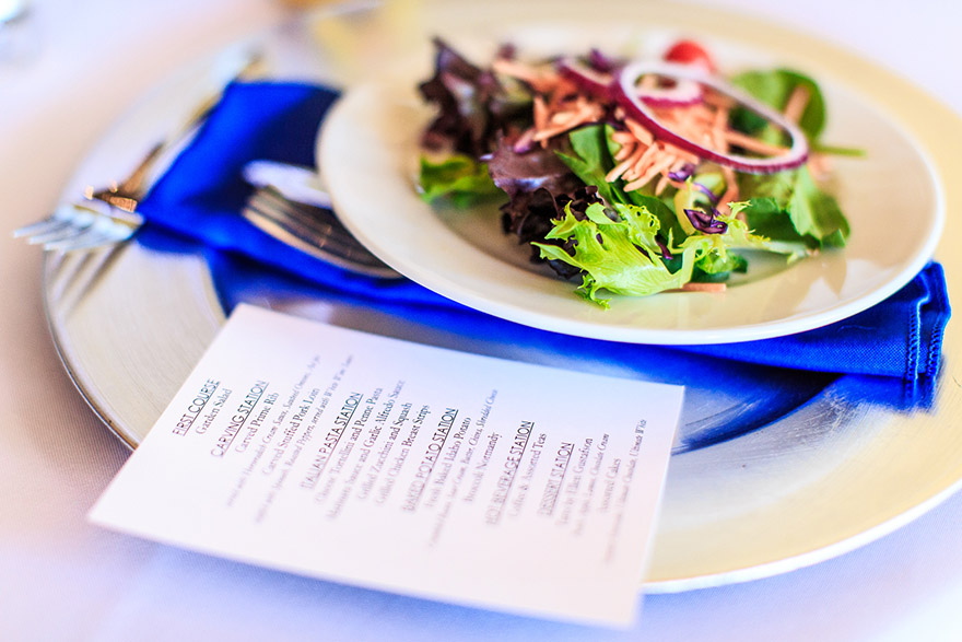Luxury caterers - menu and salad on table